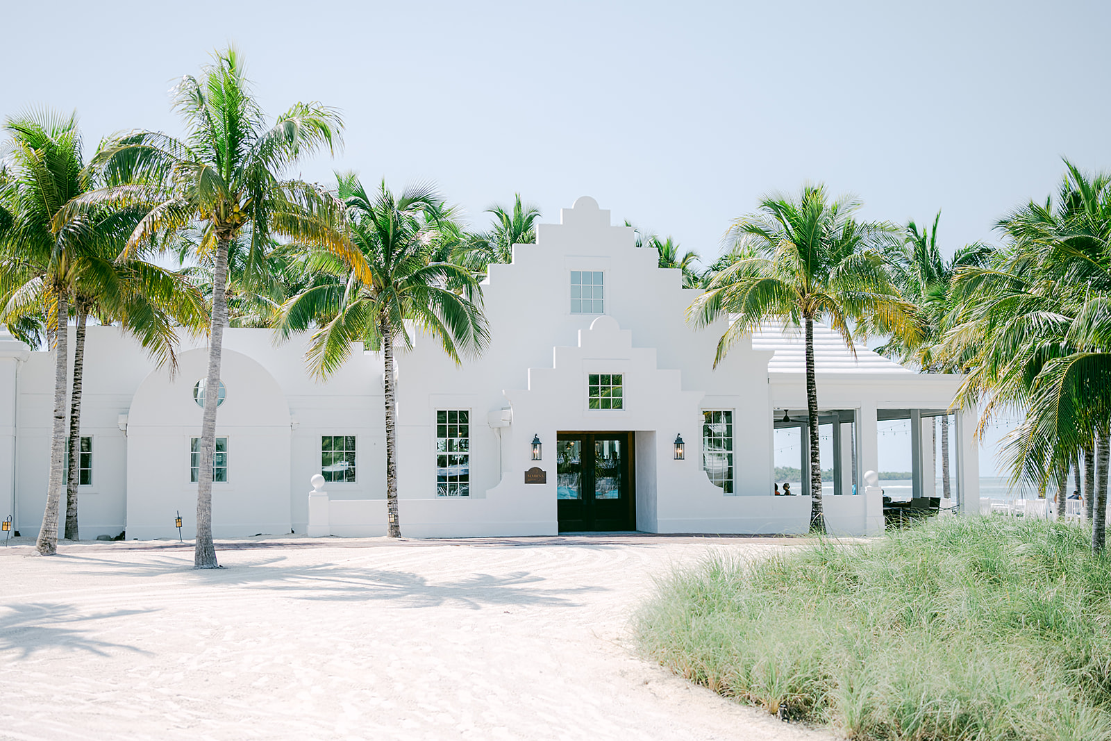 south florida wedding photographer captures Isla Bella beach resort wedding venue on a clear sunny day